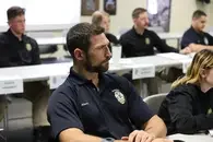 Student, Holland Ahern, listening to a lecture