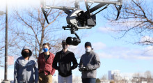 Unmanned Aerial Systems students flying a drone at the Nampa Campus Academic Building