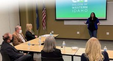 2015 graduate, Andde Mendez-Rhoades, speaks to members of the Idaho State Board of Education