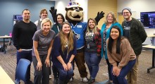 College of Western Idaho Advisors posing with Steelheads Blue Mascot