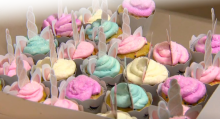 Box of unicorn-themed cupcakes