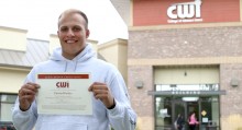 Dustin Rhodes, Exercise Science student with his civic scholarship award