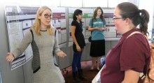 Students showcasing their research projects during the (CWI) Math and Science Hub (MASH) Fall Research F