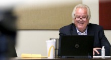 College of Western Idaho Board of Trustees Chairman, C.A. “Skip” Smyser, shares a laugh with board members over Zoom