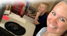 CWI employee, Nikki Houston, working remotely with her son at home