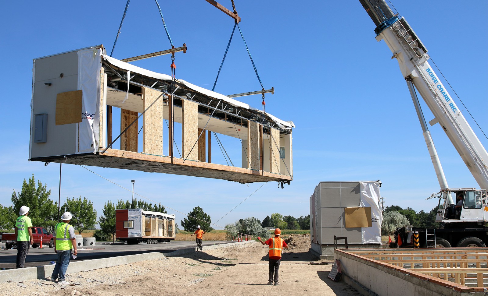 A crew from Pacific Modular Structures install buildings at the Nampa Campus on Wednesday Aug. 14.