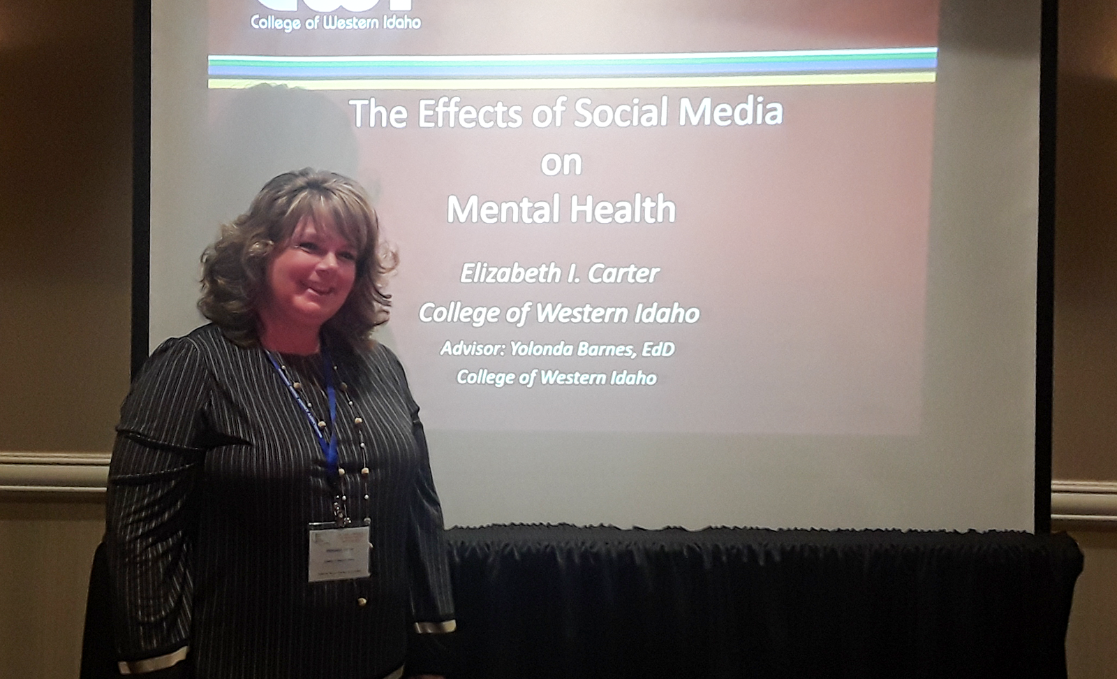Elizabeth Carter presenting research on effects of social media on mental health