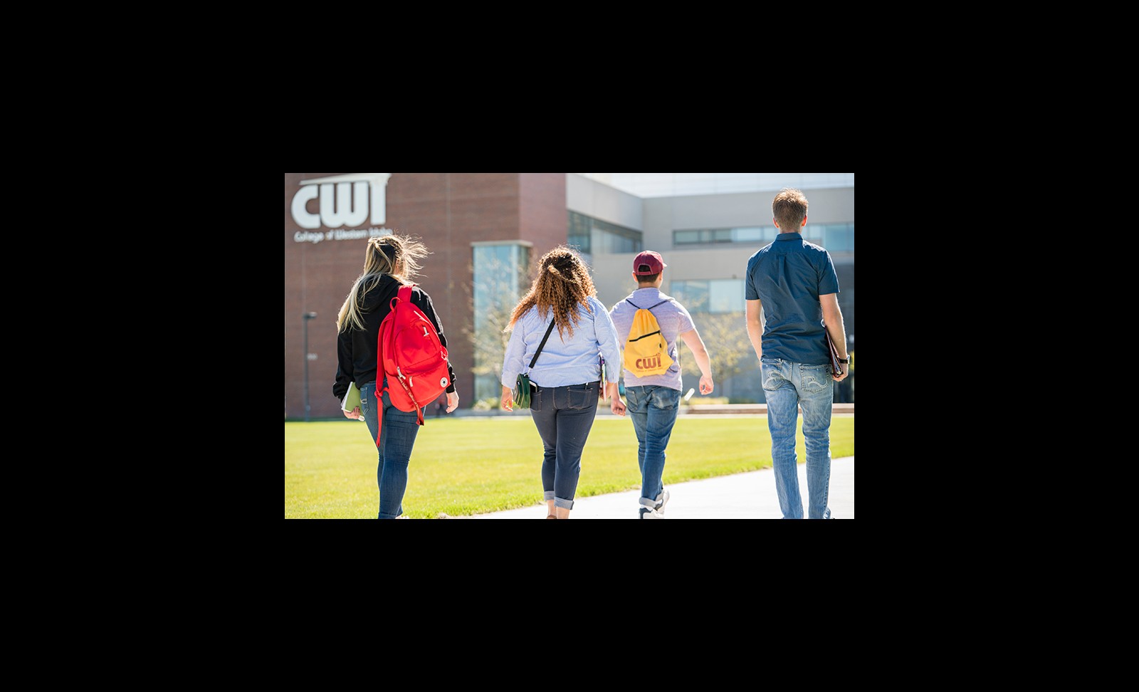 Students walking to the Nampa Campus Academic Building
