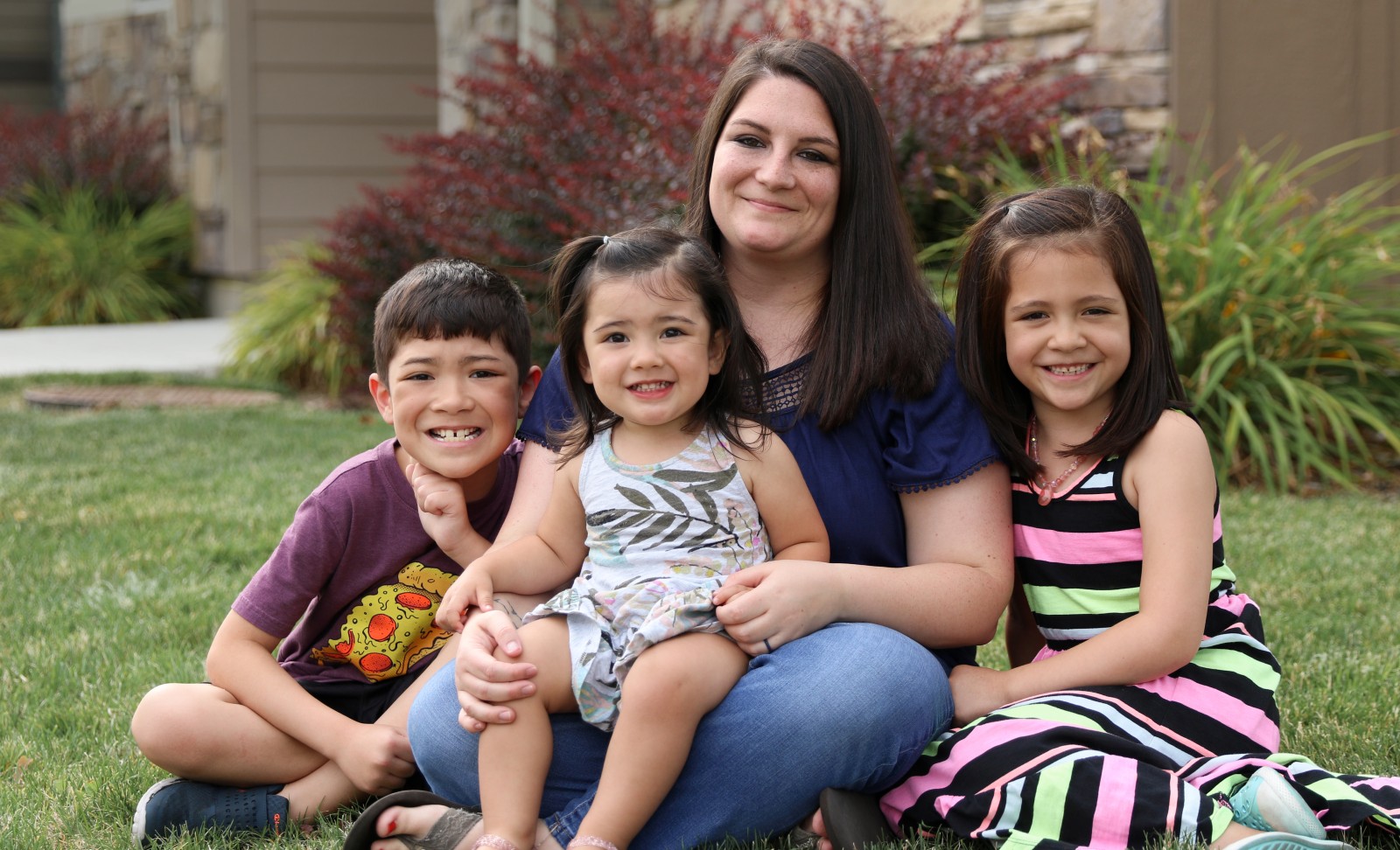 Jessica Faaofo, a 2019-2020 scholarship recipient, and her three children