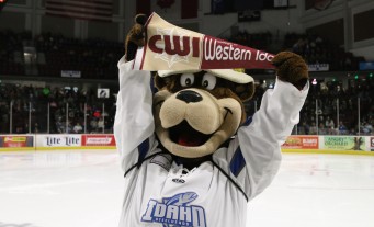 Idaho Steelheads Mascot, Blue, holding a CWI pennant