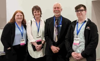 CWI students, Kylee Malouf, left, Mercedes Nelson, and Timothy Buckles with world-renowned social psychologist, Roy Baumeister. 