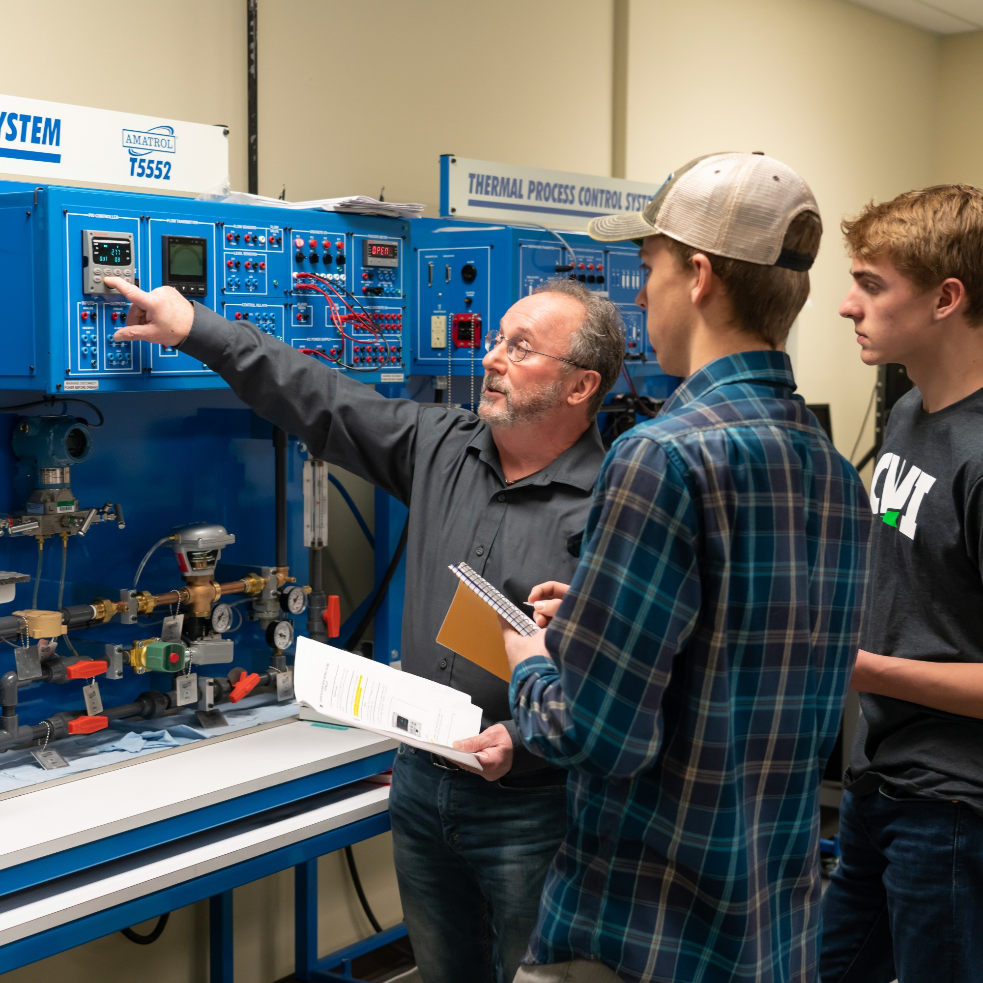 Mechatronics faculty and students learning