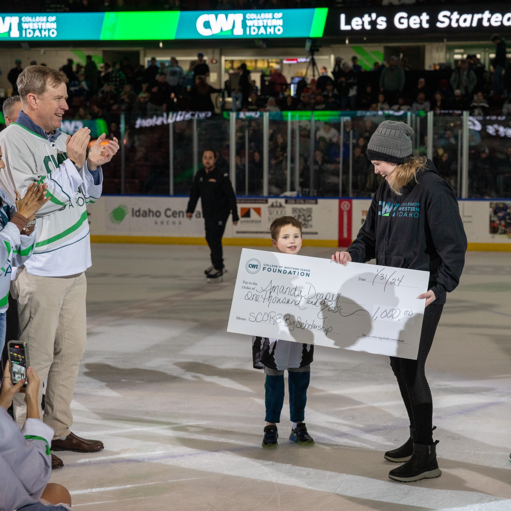 Scholarship awarded on the ice during CWI Night at the Idaho Steelheads game.