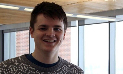 Hunter Carson, CWI student in lobby at the Nampa Campus Academic Building