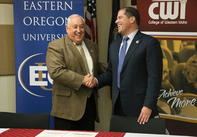 College of Western Idaho President, Bert Glandon, left, and Eastern Oregon University President, Tom Insko, after signing an articulation agreement between the two schools on Monday, Nov. 6. 2017, in Nampa, Idaho.