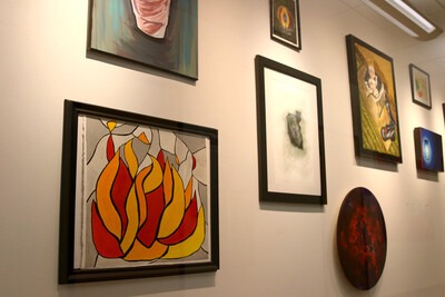 Paintings displayed in the Art Studio Gallery located at the Nampa Campus Academic Building