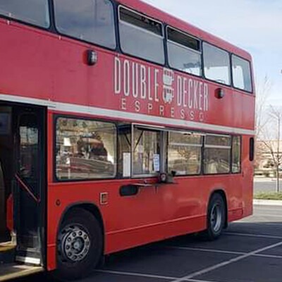 Double Decker Espresso bus in a parking lot
