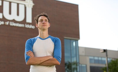 Student standing outside the Nampa Campus Academic Building