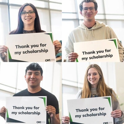 A grid of 4 students holding thank you signs.