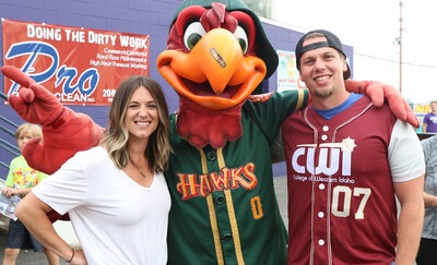 Graduates with Hawks mascot at CWI Night at the Boise Hawks
