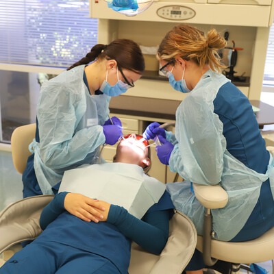 Dental assistant students in lab