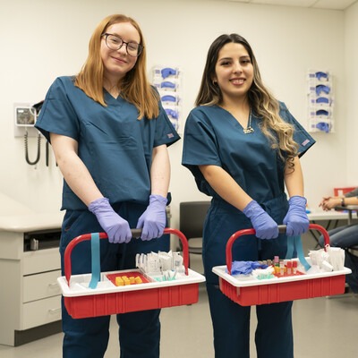Health Sciences students with medical equipment tool box