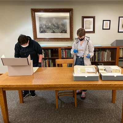 History Capstone class students from CWI searching Idaho State Archives
