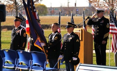Guest speaker George Nickel with the Wyakin Warrior Foundation, a student speaker, choir, and honor guard