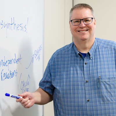Gary Heller in front of whiteboard