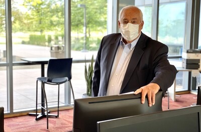 President Bert Glandon on campus wearing a mask
