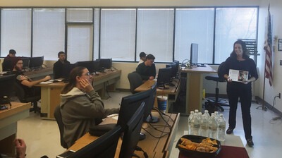 Information Security and Digital Forensics students watching presentation from INL.