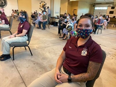 Law Enforcement graduates social distancing and wearing masks at a ceremony held at the Nampa Police Department