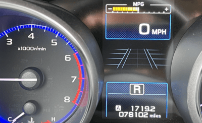 Dash of a vehicle showing mileage