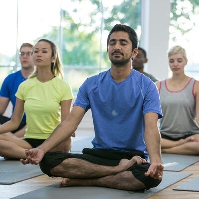 Group of people practicing yoga