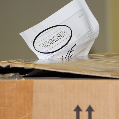 Delivery box with packing slip