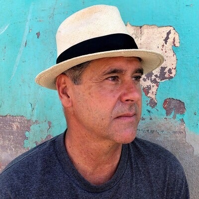 A portrait of artist Sandow Birk.