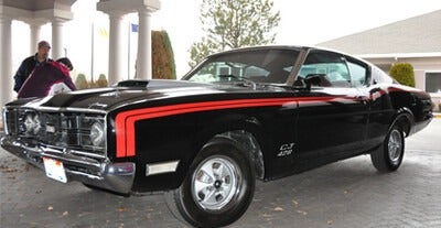 Students working on car