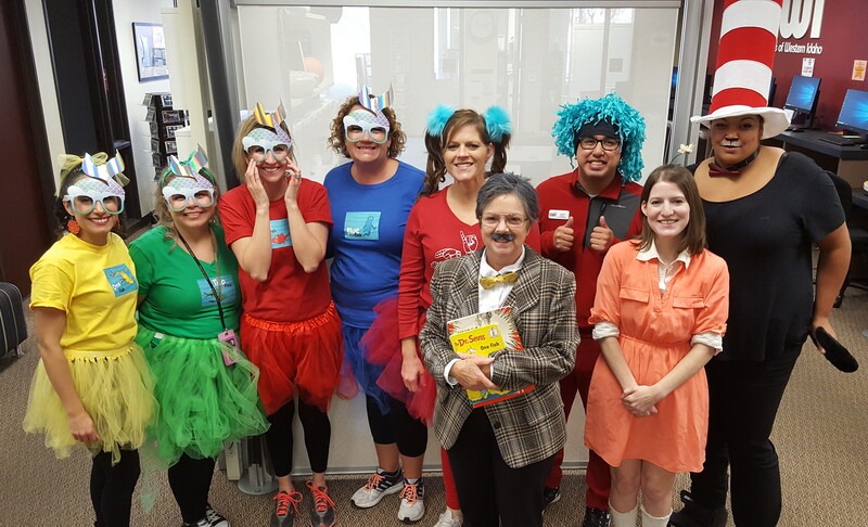 Group of employees dressed up for Halloween