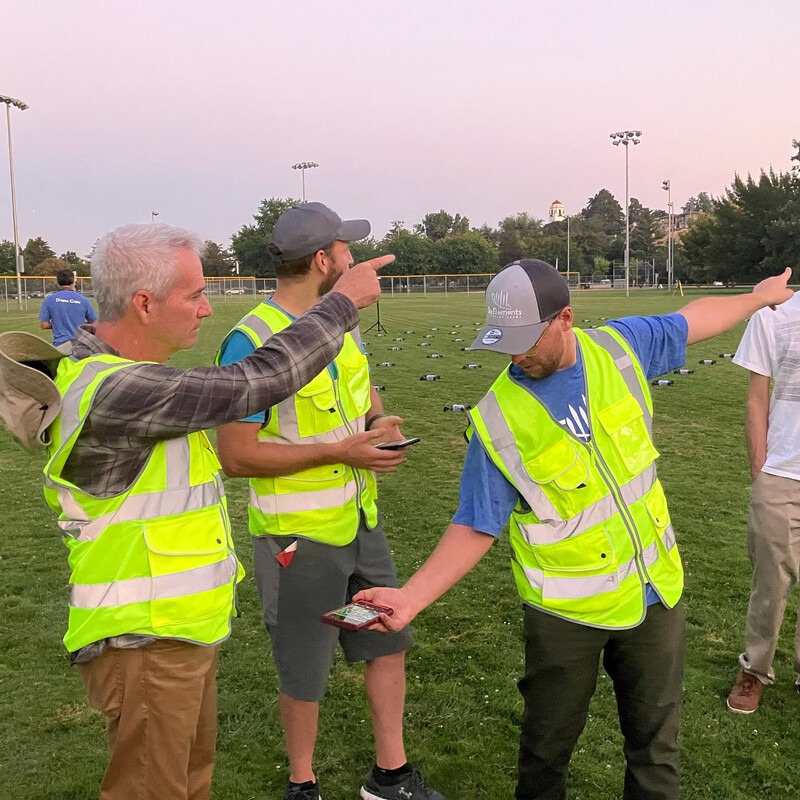 CWI students and alumni working together to set up drones