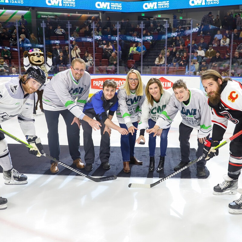 Puck drop with Trustees and students