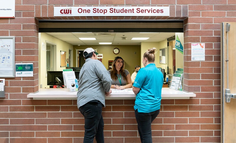 Two students visiting a One Stop location