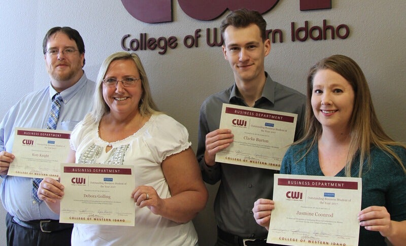 Kory Knight, Debora Golling, Clarke Burton, and Jasmine Coonrod; Outstanding Business Students of the Year