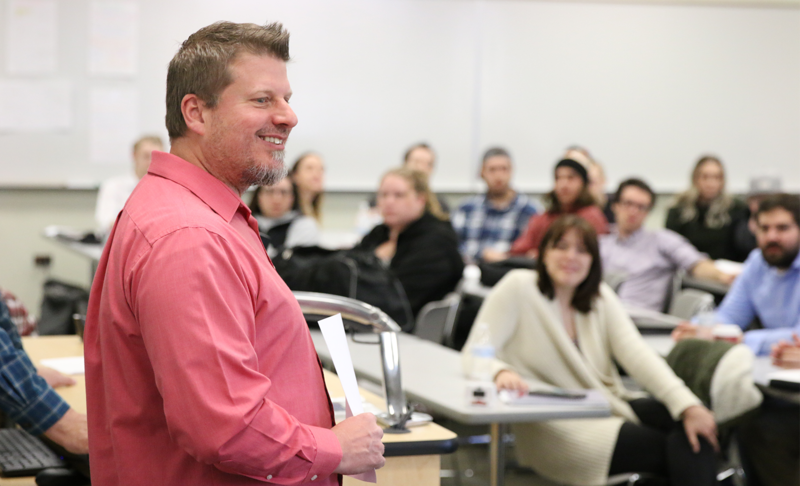 Johnny Rowing speaking to students at Rookie Debate Tournament