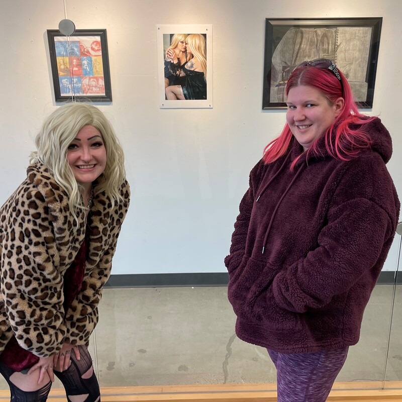 2022 Juried Art Exhibition winner, Christy Runion, right, alongside the model for her photography submission on display at the N