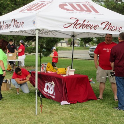 CWI booth with street team students