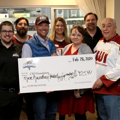 Steelheads present a check to CWI Foundation