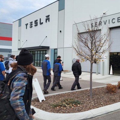 Students visiting Tesla Service Center