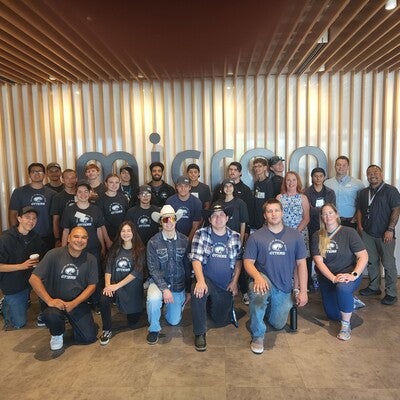 Group of people posing and looking at the camera