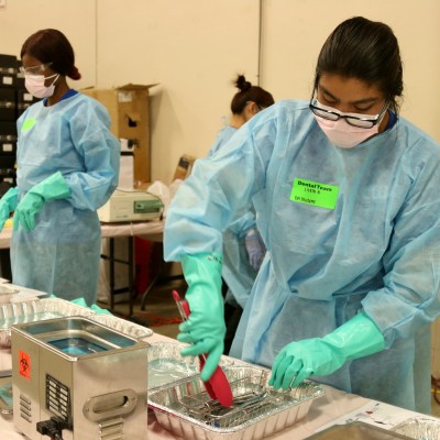Dental Assistant students volunteering at the Amen Free Clinic at Expo Idaho.