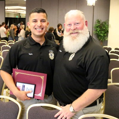 Law Enforcement students celebrate graduation with family and friends during a ceremony on May 16.